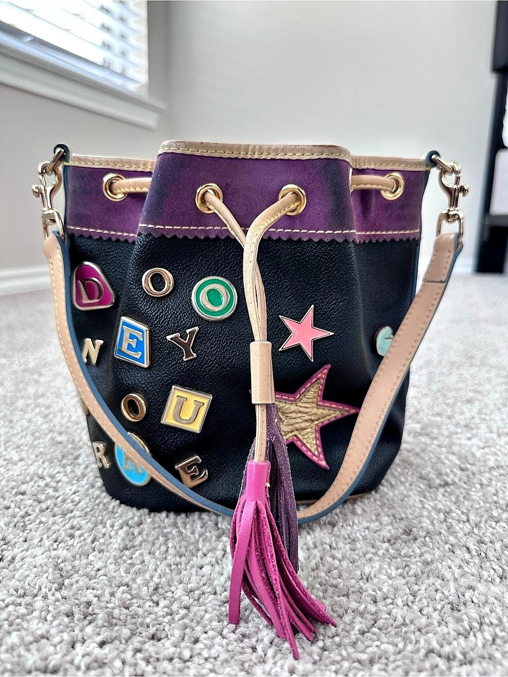Dooney & Bourke Y2K Alphabet Charm Mini Drawstring Bucket Bag Black & Purple